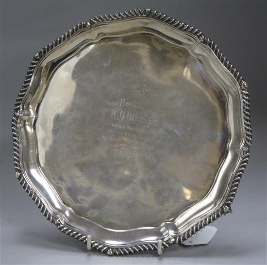 A presentation circular silver salver, 16oz approx